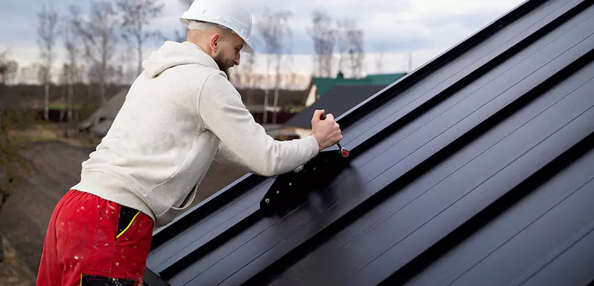 Tin Roof Ridge Cap Installation in Skokie